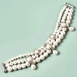 LucyQ Freshwater White Cultured Pearl And White Zircon Bracelet In Rhodium Over Sterling Silver (7.50 In) 9.40 Grams 0.50 Ctw 9 LucyQ Freshwater White Cultured Pearl And White Zircon Bracelet In Rhodium Over Sterling Silver (7.50 In) 9.40 Grams 0.50 Ctw -Jewelry store 3858915 1