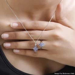 Tanzanite Cluster Ring And Pendant In Platinum Over Sterling Silver (Del. In 7-10 Days) 1.75 Ctw 11 Tanzanite Cluster Ring And Pendant In Platinum Over Sterling Silver (Del. In 7-10 Days) 1.75 Ctw -Jewelry store 4165737 2