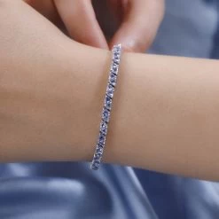 Tanzanite Tennis Bracelet In Platinum Over Sterling Silver (8.00 In) 12.10 Grams 6.60 Ctw 9 Tanzanite Tennis Bracelet In Platinum Over Sterling Silver (8.00 In) 12.10 Grams 6.60 Ctw -Jewelry store 7023329 2