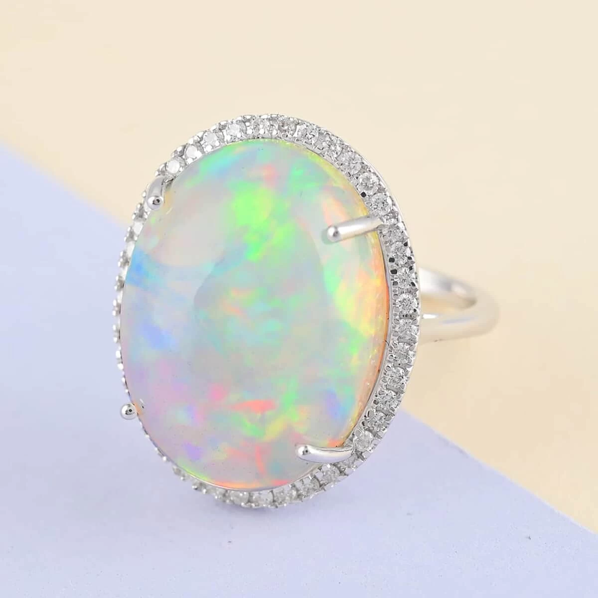 Certified & Appraised ILIANA 18K White Gold AAA Ethiopian Welo Opal, Diamond (G-H, SI) (0.54 Cts) Halo Ring (4.60 G) 13.40 Ctw 4 Certified & Appraised ILIANA 18K White Gold AAA Ethiopian Welo Opal, Diamond (G-H, SI) (0.54 Cts) Halo Ring (4.60 G) 13.40 Ctw - Image 2