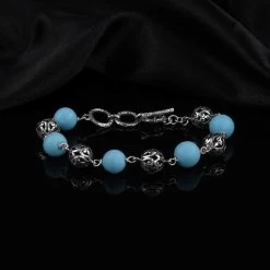 Bali Legacy Constituted Sleeping Beauty Turquoise Toggle Clasp Fleur De Lis Heart Bracelet In Sterling Silver (7.0-8.0In) 32.10 Ctw -Jewelry store 7155073 1