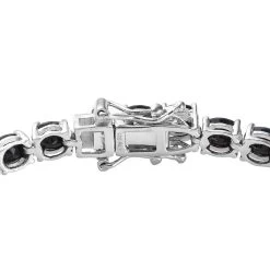 Australian Midnight Sapphire Tennis Bracelet In Platinum Over Sterling Silver (6.50 In) 7.75 Grams 16.00 Ctw 10 Australian Midnight Sapphire Tennis Bracelet In Platinum Over Sterling Silver (6.50 In) 7.75 Grams 16.00 Ctw -Jewelry store 7247492 3