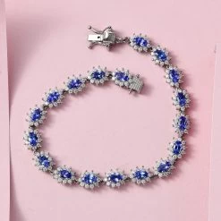 AAA Tanzanite And Moissanite Bracelet In Platinum Over Sterling Silver (7.25 In) 13.50 Grams 7.40 Ctw 10 AAA Tanzanite And Moissanite Bracelet In Platinum Over Sterling Silver (7.25 In) 13.50 Grams 7.40 Ctw -Jewelry store 7276109 1