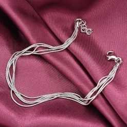 Italian Rhodium Over Sterling Silver 5 Lines Star Dust Snake Bracelet (7.00 In) 4.70 Grams -Jewelry store 7382402 1