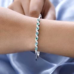 AAA Kagem Zambian Emerald And White Zircon Bangle Bracelet In Platinum Over Sterling Silver (7.25 In) 1.35 Ctw 10 AAA Kagem Zambian Emerald And White Zircon Bangle Bracelet In Platinum Over Sterling Silver (7.25 In) 1.35 Ctw -Jewelry store 7515057 2