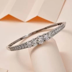 Moissanite (Ovl 9x7mm) Bangle Bracelet In Platinum Over Sterling Silver (6.50 In) 7.90 Ctw -Jewelry store 7601731 1